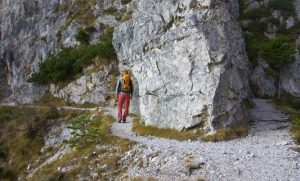 Walking along the initial part of the Born Trail (Slotrips.si).